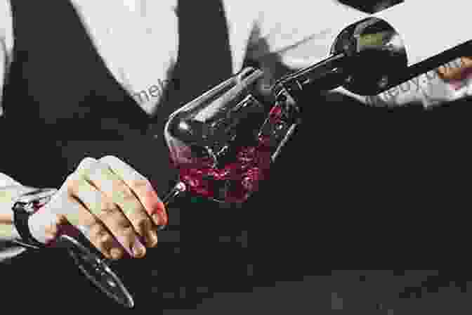 A Close Up Of A Sommelier Pouring Wine For A Group Of People John Schreiner S Okanagan Wine Tour Guide 5th Edition: The Wineries Of British Columbia S Interior