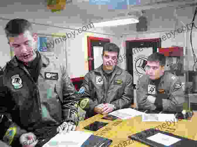 A Group Of Fighter Pilots Sitting In A Briefing Room Race Of Aces: WWII S Elite Airmen And The Epic Battle To Become The Master Of The Sky