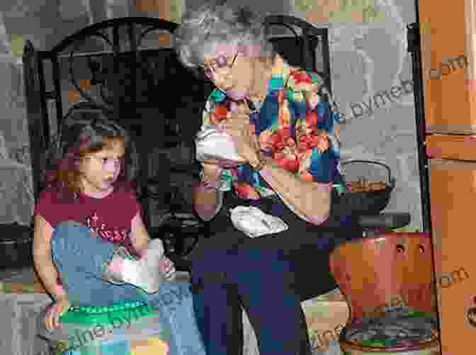 A Woman Looking At An Old Photograph Of Her Mother, A Bittersweet Reminder Of Their Bond And The Loss She Carries In My Mother S Footsteps: A Palestinian Refugee Returns Home