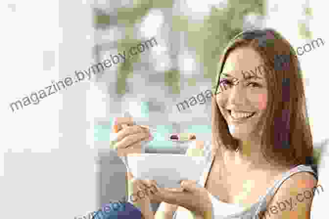 A Woman Smiling And Holding A Healthy Meal The Glycemic Load Diet: A Powerful New Program For Losing Weight And Reversing Insulin Resistance