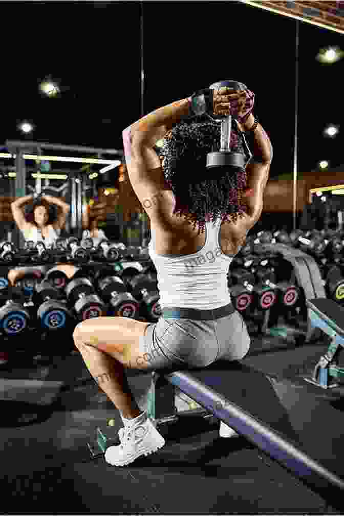 Confident Woman Lifting Weights In A Gym, Symbolizing Strength And Fitness Goals. Strength Training For Beginners: A 12 Week Program To Get Lean And Healthy At Home