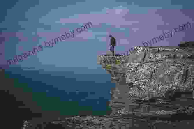 Joseph Garland Standing On The Edge Of A Cliff, Looking Out Over A Vast And Beautiful Landscape Lone Voyager Joseph E Garland