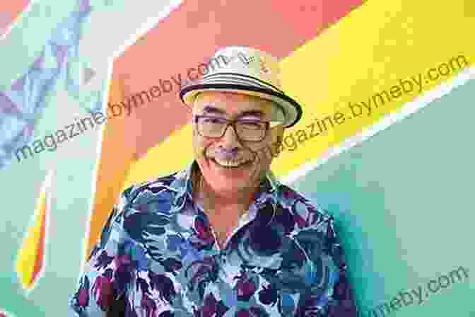 Juan Felipe Herrera Holding Several Awards, Including The National Medal Of Arts Imagine Juan Felipe Herrera